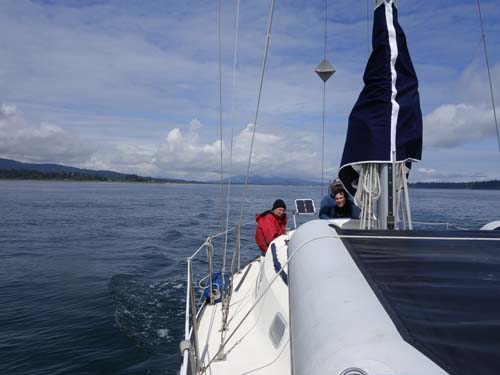 Kevin, Dad and Barnucka in Cordova Channel. Island View beach to the left and James Island on the right