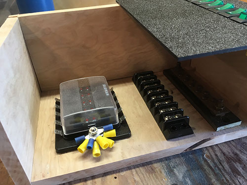 So I built a box out of maple to house the fuses panel and two terminal strips.