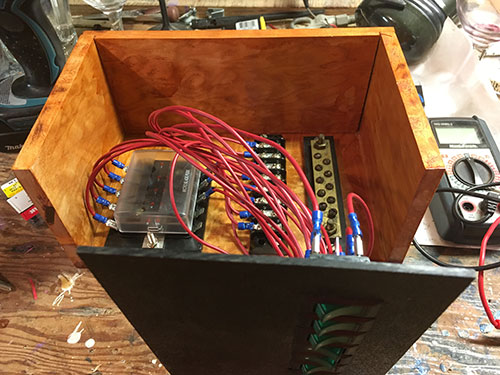 I'm just waiting for my 4 port power panel to arrive from China. Next steps include mounting the new part, re-cutting plastic face panel and mounting on board T2. 