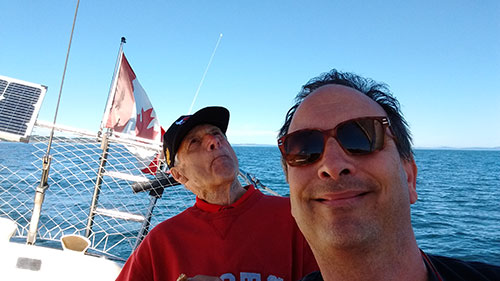 Dad and I under sail in Haro Strait.