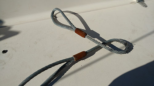Galvinized steel rop bridal. Only lasted 2 months and 1 gale.
