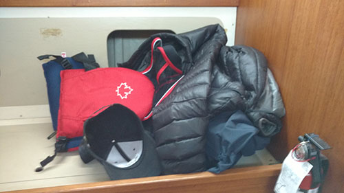 To ward off the cold. I'm wearing long Johns, and here is my down sweater, gortex jacket, pfd and insulated ear muffs.
