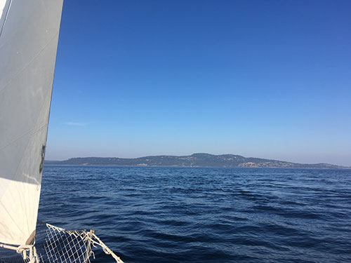 A North wind pushes Trouper 2 toward the American San Juan Islands.