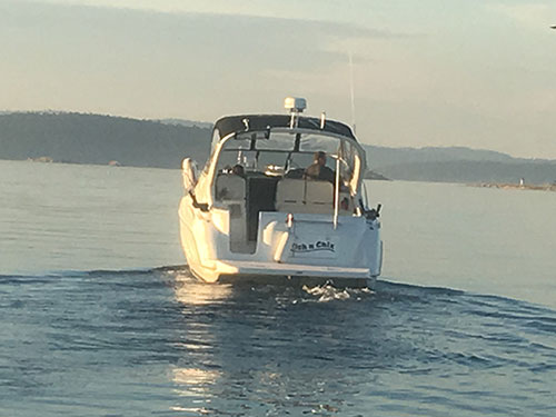 Captain Terry and partner leave the spit on-board 'Fish N' Chix' after dropping off a couple of Dungeness crabs.