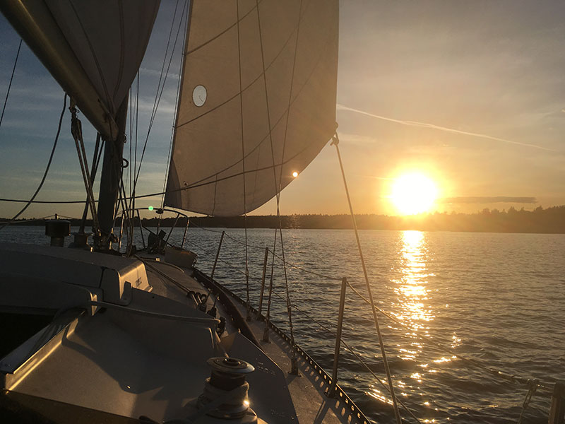 Sailing to Cadboro Bay as the golden sun sets.