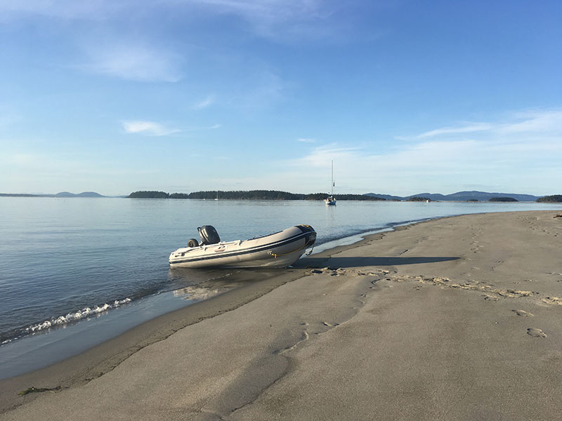 Skully with T2 at anchor in the background.