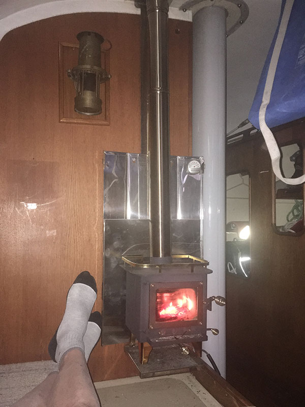 Bedtime by the fire. (As the cabin fills with smoke)