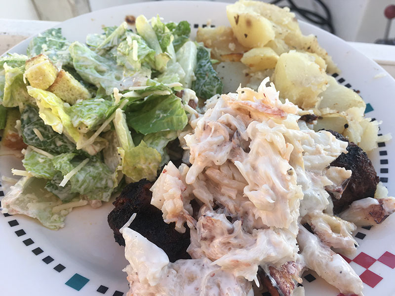Steak Oscar featuring fresh Sidney Spit crab, Caesar salad and baked potatoes. A feast fit for King Neptune.