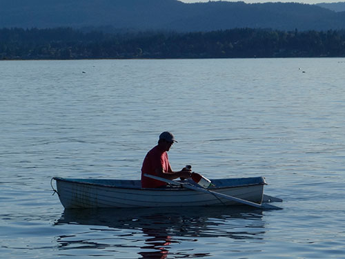 Eric hauls in the crab trap at Sidney Spit.