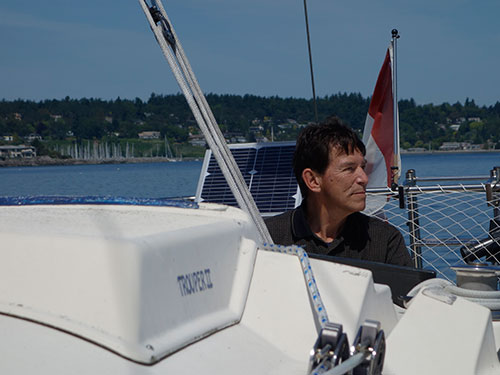 Barnucka Smith on the helm leaving Cadboro Bay.