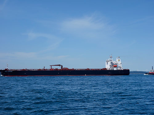 Cargo ship navigating without a chart plotter.