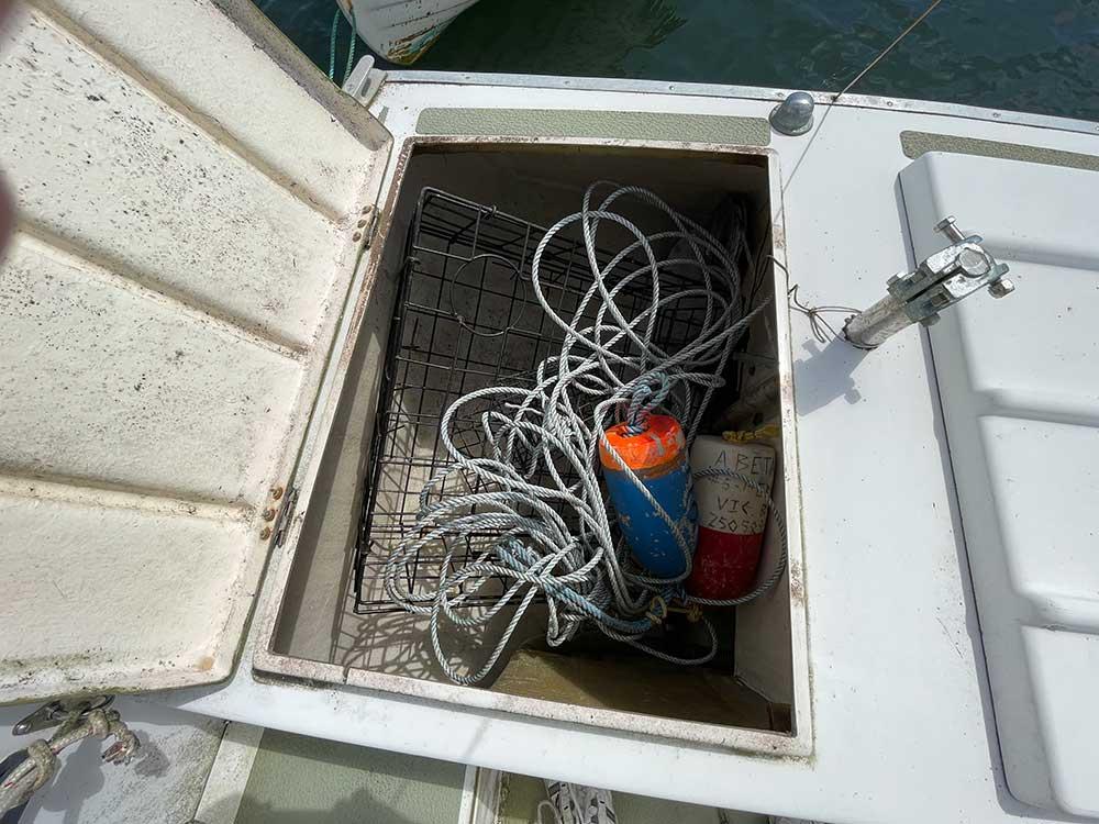 Starboard lazarette. Check out the crab trap!