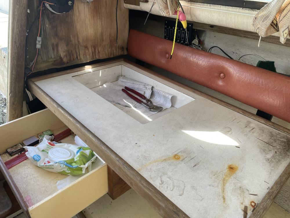 The original port side galley slider. Notice the cut out, over the drawer. I just assumed that was used for some kind of stove.