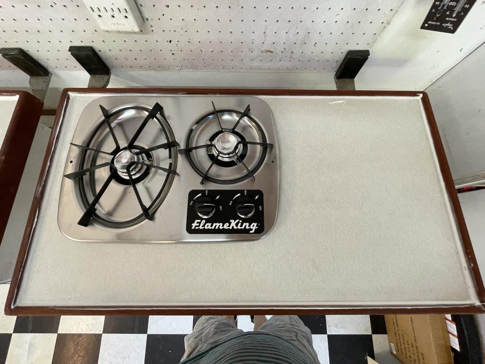 I had to enlarge the cut-out to take the new stove.