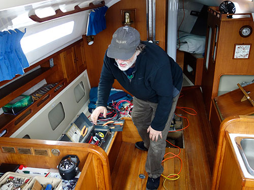 Tom sorts through the mayhem, looking for the right gage wire.